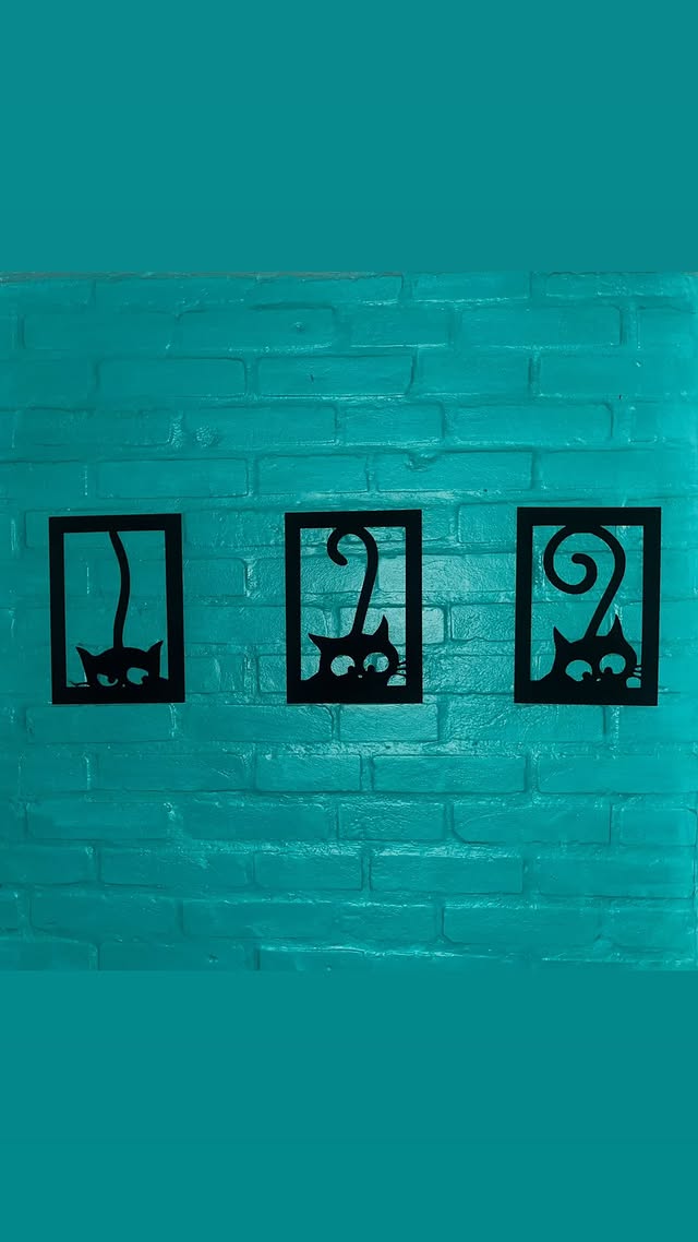 Quadros decorativos com silhuetas de gatos
